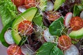 Avocado salad with sprouts tomatoes spinach