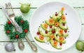 Avocado salmon salad shaped Christmas tree Royalty Free Stock Photo
