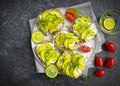 Avocado sandwich, healthy tomato savory dinner on concrete background