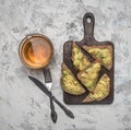 Avocado sandwiches and tea, healthy breakfast concept on white background