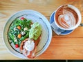 Avocado Smash with Rocket, Poached Eggs, and Coffee