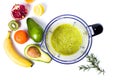 Avocado smoothie in a blender with various ingredients Royalty Free Stock Photo