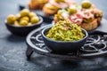 Avocado spread, guacamole with fried bread, substitute for toast and olives