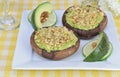 Avocado stuffed portobello mushrooms.