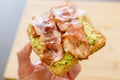 Avocado toast with cherries tomatoes and bacon Royalty Free Stock Photo