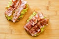 Avocado toast with cherries tomatoes and bacon Royalty Free Stock Photo