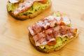 Avocado toast with cherries tomatoes and bacon Royalty Free Stock Photo