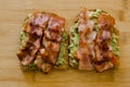 Avocado toast with cherries tomatoes and bacon Royalty Free Stock Photo