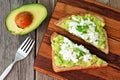 Avocado toast with egg whites and pea shoots, overhead view Royalty Free Stock Photo