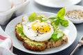 Avocado toast with fried egg Royalty Free Stock Photo