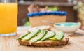 Avocado toast with hummus and black pepper