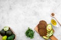 Avocado toast for light healthy breakfast on grey background top view copy space