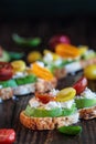 Avocado Toast with Avocado Tomatoes Basil and Feta Cheese Royalty Free Stock Photo