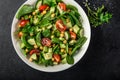Avocado, tomato, chickpeas, spinach and cucumber salad Royalty Free Stock Photo