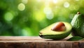 avocado on the wooden in blur green background