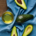 Avocadoes on blue Royalty Free Stock Photo