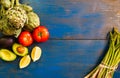 Avocados asparagus tomatoes and artichokes with lemon