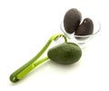 Avocados in glass bowl with slicer