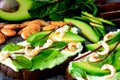 Avocados, greens, shrimps. Toast with avocado paste and shrimp. Royalty Free Stock Photo