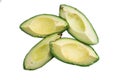 Avocatto slices on a white background