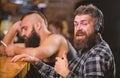 Avoid communication. Escape reality. Friday relaxation in bar. Hipster bearded man spend leisure at bar counter. Order Royalty Free Stock Photo