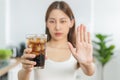 Avoid, limits sweet sugar, asian young woman, girl push stop, deny a glass of cold cola soft drink soda, sparkling water with ice Royalty Free Stock Photo