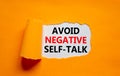 Avoid negative self-talk symbol. Concept words Avoid negative self-talk on a beautiful orange background. Psychological and Avoid