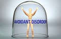 Avoidant disorder can separate a person from the world and lock in an isolation that limits - pictured as a human figure locked