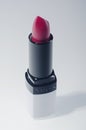 Avon lipstick isolated on gradient background. Royalty Free Stock Photo
