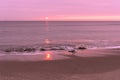 sunrise sky with shore birds and seagulls flying over the Atlantic Ocean near the Shark River Inlet