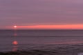 sunrise sky with shore birds and seagulls flying over the Atlantic Ocean near the Shark River Inlet Royalty Free Stock Photo