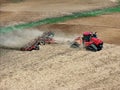 Case 620 Quadtrac tractor pulling a .Kwik-Till HSD 4000 disk crumbler Royalty Free Stock Photo