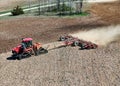 Case 620 Quadtrac tractor pulling a .Kwik-Till HSD 4000 disk crumbler