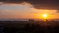 Avonmouth harbour in Bristol with windmills and in the middle of sunset with colorful clouds and the factory Royalty Free Stock Photo