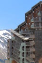 Wooden apartments against white mountains in Avoriaz, France Royalty Free Stock Photo