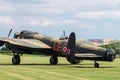 Avro Lancaster bomber `Just Jane` taxiing on airfield Royalty Free Stock Photo