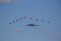The Avro Vulcan XH558 being escorted by the Red Arrows