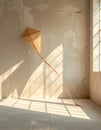 Awaiting Flight - Kite in a Sun-Drenched Room Royalty Free Stock Photo