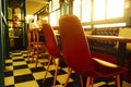 Awaiting Guests: An Empty Morning Seat in an Open Cafe