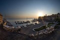 Awakening Serenity: Sunrise over Porto Santo Stefano\'s Coastal Beauty