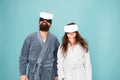 Awakening from virtual reality. Couple in bathrobes wear vr glasses. Conscious awakening. Return to reality. Man and