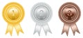 Award ribbon in gold, silver and bronze with laurel wreath as vector on white isolated background. Royalty Free Stock Photo