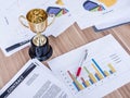 Award trophy on working table with document and contract Royalty Free Stock Photo