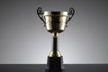 Award winning trophy in gray background Royalty Free Stock Photo