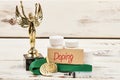 Awards and container with doping. Royalty Free Stock Photo