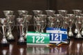 Race numbers, participation medal, and awards Royalty Free Stock Photo