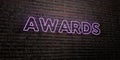 AWARDS -Realistic Neon Sign on Brick Wall background - 3D rendered royalty free stock image