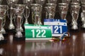 Race numbers, participation medal, and awards Royalty Free Stock Photo