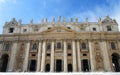 a large church with pillars and statues on the outside of it Royalty Free Stock Photo