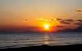 Awe-inspiring sunset with vibrant colors of pink, orange, and yellow lighting up the sky